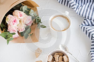 Romantic feminine background with coffee and roses