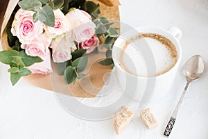 Romantic feminine background with coffee and roses