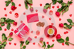 Romantic flat lay composition for Valentine's day. Red roses, hearts, coffee cup, gift box, chocolate, candles and