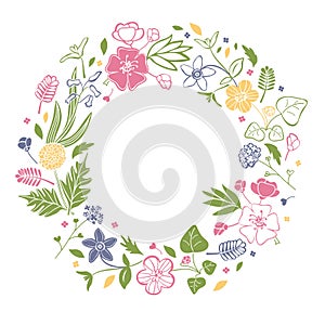 Romantic floral round frame with cute flowers. Beautiful wreath isolated on white background