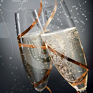 Romantic flutes of sparkling golden champagne