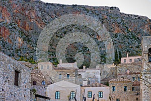 Romantic fortified greek village on rock island Monemvasia at sunset