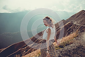Romantic free young woman with hair wind enjoy harmony with nature and fresh air. Peace of mind. Happy tranquil girl, inspiration