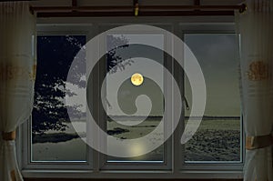 Romantic full moon night in window view