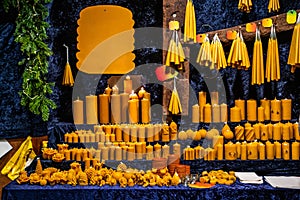 Romantic german Christmas market with illuminated shop for colorful candles - candle maker