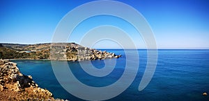 Romantic Ghajn Tuffieha Bay panorama at Malta photo