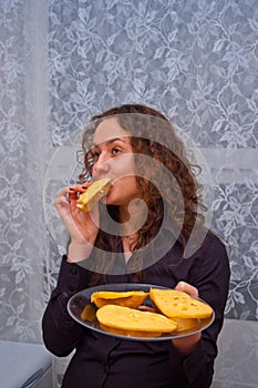 Romantic girl eating cheese sandwich