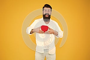 Romantic greeting. bearded man red heart. brutal hipster yellow background. happy valentines day. heart poblems and
