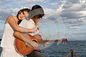 Romantic guitar couple photo