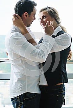 Romantic happpy couple on balcony