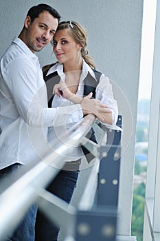 Romantic happpy couple on balcony