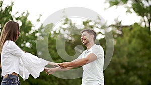 Romantic Happy Couple Having Fun And Dancing Outdoors In Nature.