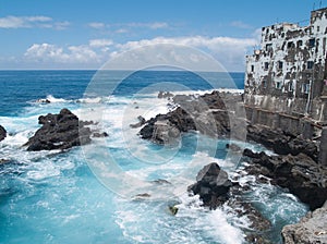 Romantic houses at the edge of ocean