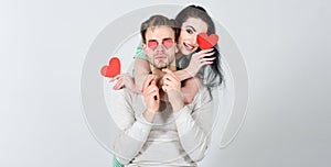 Romantic ideas celebrate valentines day. Man and woman couple in love hold red heart valentines cards white background