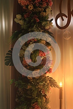 romantic indoor decoration with fresh flowers for weddings, fiancÃ©s, ceremonies.