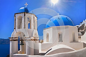 Romantic island  - Santorini,  Oia village, blue churches