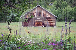 Romantic landscape and old antique barn in the countryside in Norway.