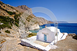 Romantic landscape view of beach with chapel on Amorgos, Greece
