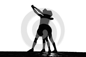 Romantic latino hispanic couple in love is dancing bachata. 2 Two silhouettes isolated on white background. couple hugging. Latin