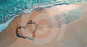 A romantic love heart drawn in the sand on a beautiful beach