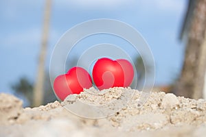 Romantic love symbol two red heart on the paradise tropical beach with copy space. Valentine day and Marry Concept