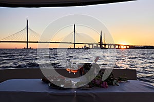 Romantic luxury evening on cruise yacht with champagne setting