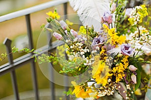 Romantic luxury evening on restaurant terrace decorated and table served with flowers and candles for wedding romantic dinner