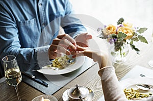 Romantic Man Giving a Ring to Propose Woman on a Date