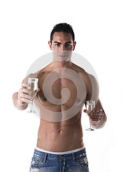 Romantic man offering a flute of champagne