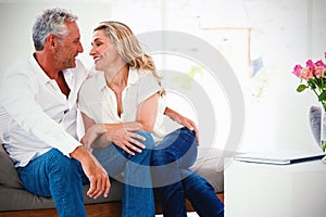 Romantic mature couple sitting face to face