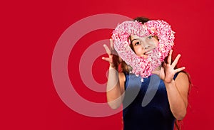 Romantic mood. Happy child hold heart red background. Little girl with pink heart. Heart shaped decor valentines day