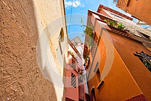 Romantic narrow Alley of the Kiss Callejon del Beso in Guanajuato colorful historic city center