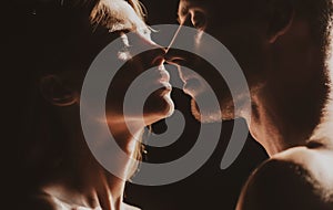 Romantic night date. Close up face of sensual portrait of a sexy couple embracing while dating. Young couple in love on