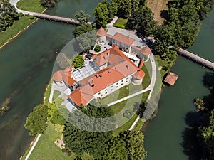 Romantic Otocec Castle on Krka River in Slovenia. Drone View.