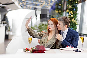 Romantic pastime of young caucasian couple in restaurant