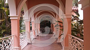 Romantic path among pink pilasters photo