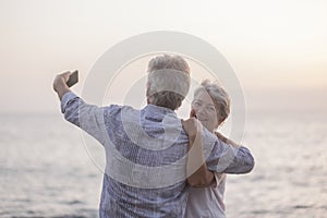 Romantic people couple of senior man and woman hugging