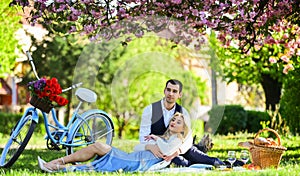 Romantic picnic. Anniversary concept. Idyllic moment. Man and woman in love. Picnic time. Spring date. Playful couple