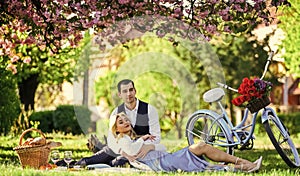 Romantic picnic. Anniversary concept. Idyllic moment. Man and woman in love. Picnic time. Spring date. Playful couple