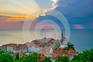 Romantic picturesque sunset over old town of Piran, Slovenia
