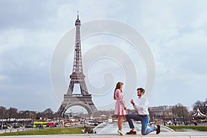 Romantic proposal in Paris, engagement