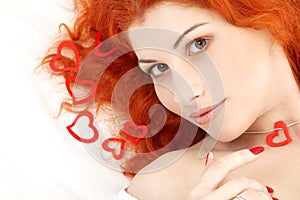 Romantic redhead with read hearts