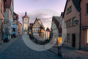 romantic Rothenburg ob der Tauber in the evening with city lights