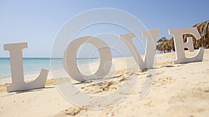 Romantic sign on a tropical beach paradise