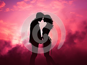 romantic silhouette of kissing couple on pink and fuchsia sunset background, Valentine\'s day greeting card, space for text