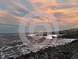 Romantic sky rough sea and beach