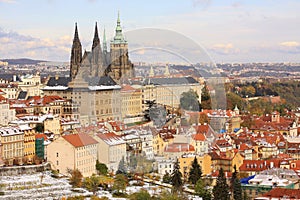 Romantic snowy colorful autumn Prague gothic Castle, Czech Republic