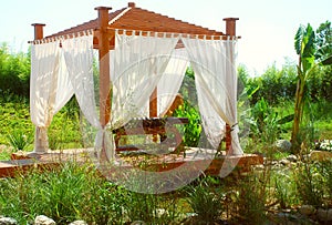 Romantic spa pavilion with curtain