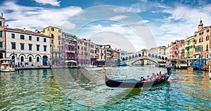 Romantic spring scene of famous Canal Grande. Colorful morning panorama with Rialto Bridge. Picturesque cityscape of  Venice,