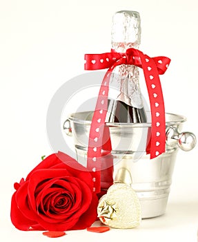 Romantic still life champagne, roses, gifts
